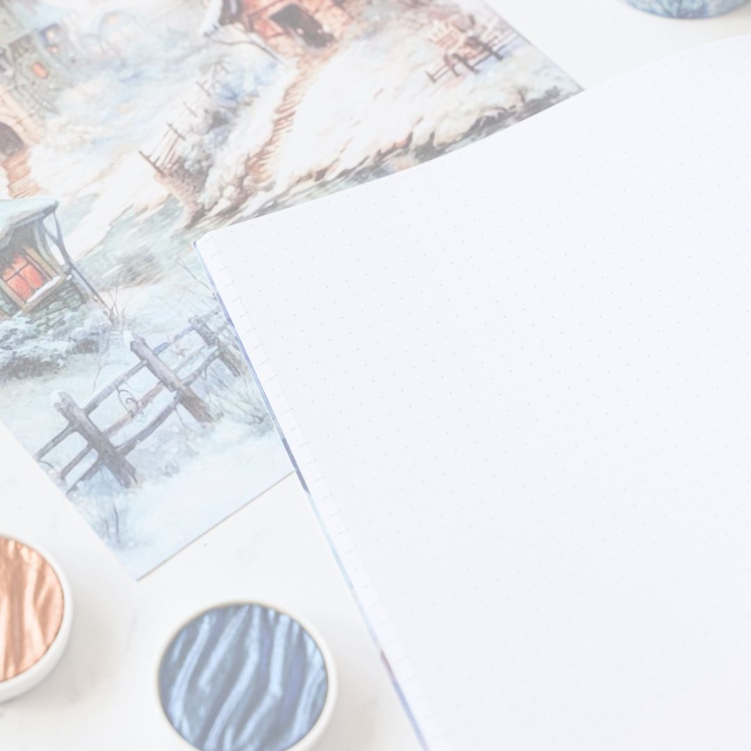 Decorative paper with winter scene design on a white surface and Coliro Pearlcolors