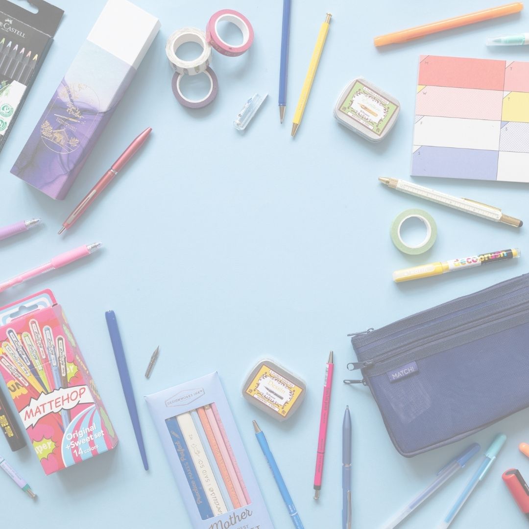 Assorted stationery items including pens, pencils, and a pencil case on a light blue background