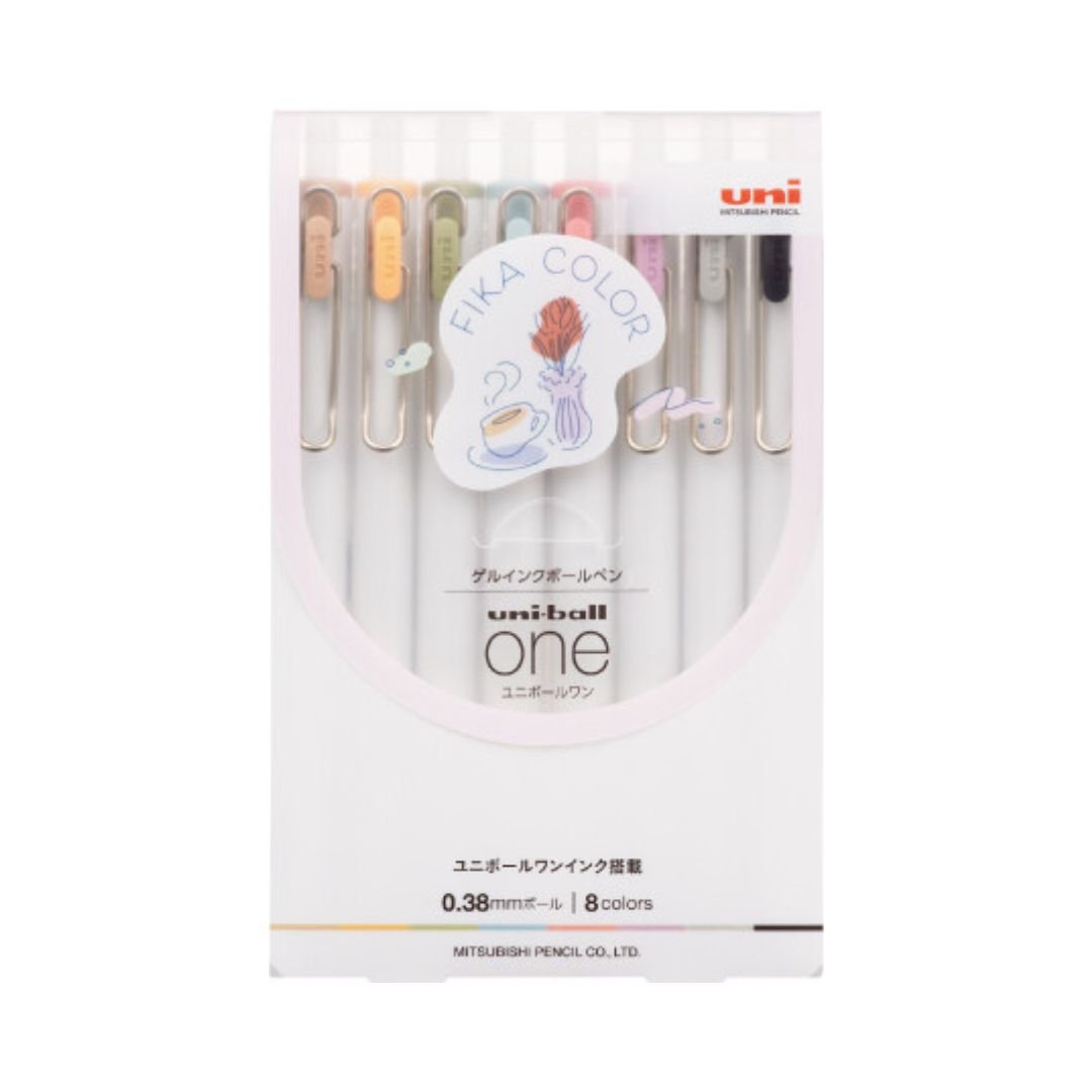 A package of Uni Ball One 8-color gel pens in a white box with a clear front window showing the pens inside. The packaging features a sticker that reads 'FKA COLOR' with a floral illustration.